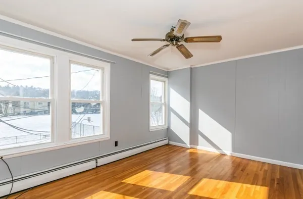 a view of an empty room and window