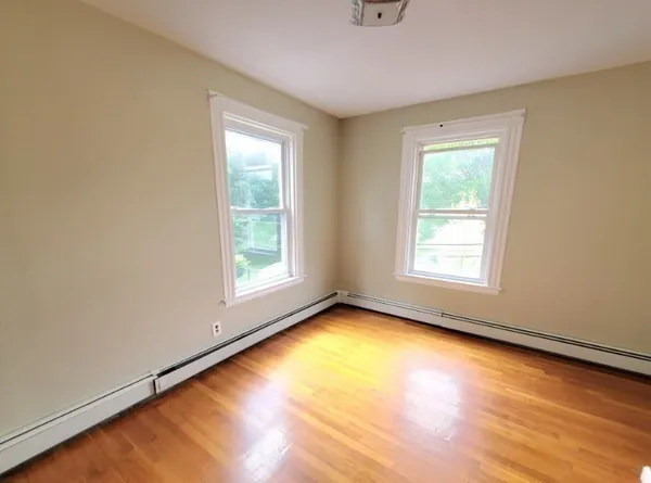 an empty room with window
