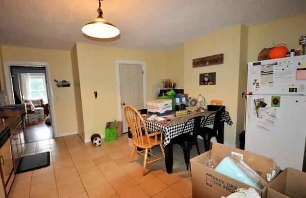 a workspace with furniture and wooden floor
