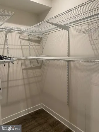 a view of a room with racks on the wall