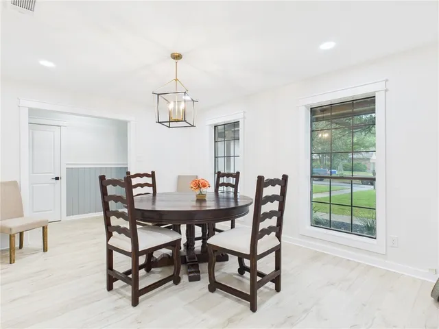 a view of a dining room with furniture