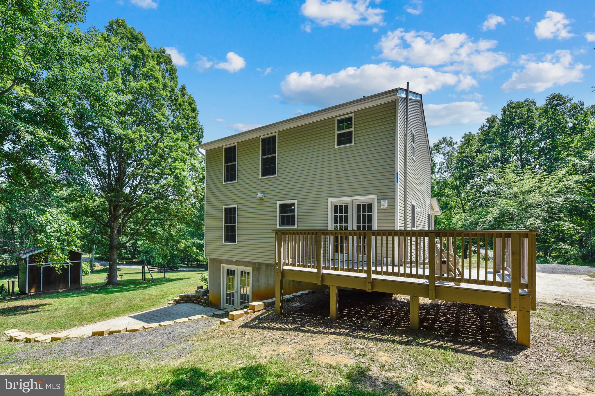 14518 Thickett Ridge Lane Rixeyville, VA 22737 - Photo 2 of 20 Rear view with deck and concrete patio