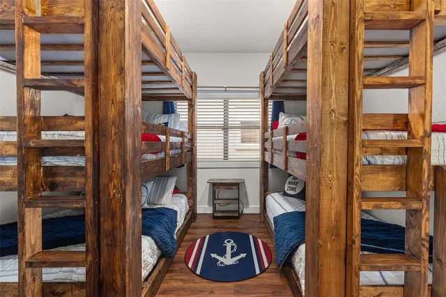 a view of living room with a flat tv screen and a fireplace