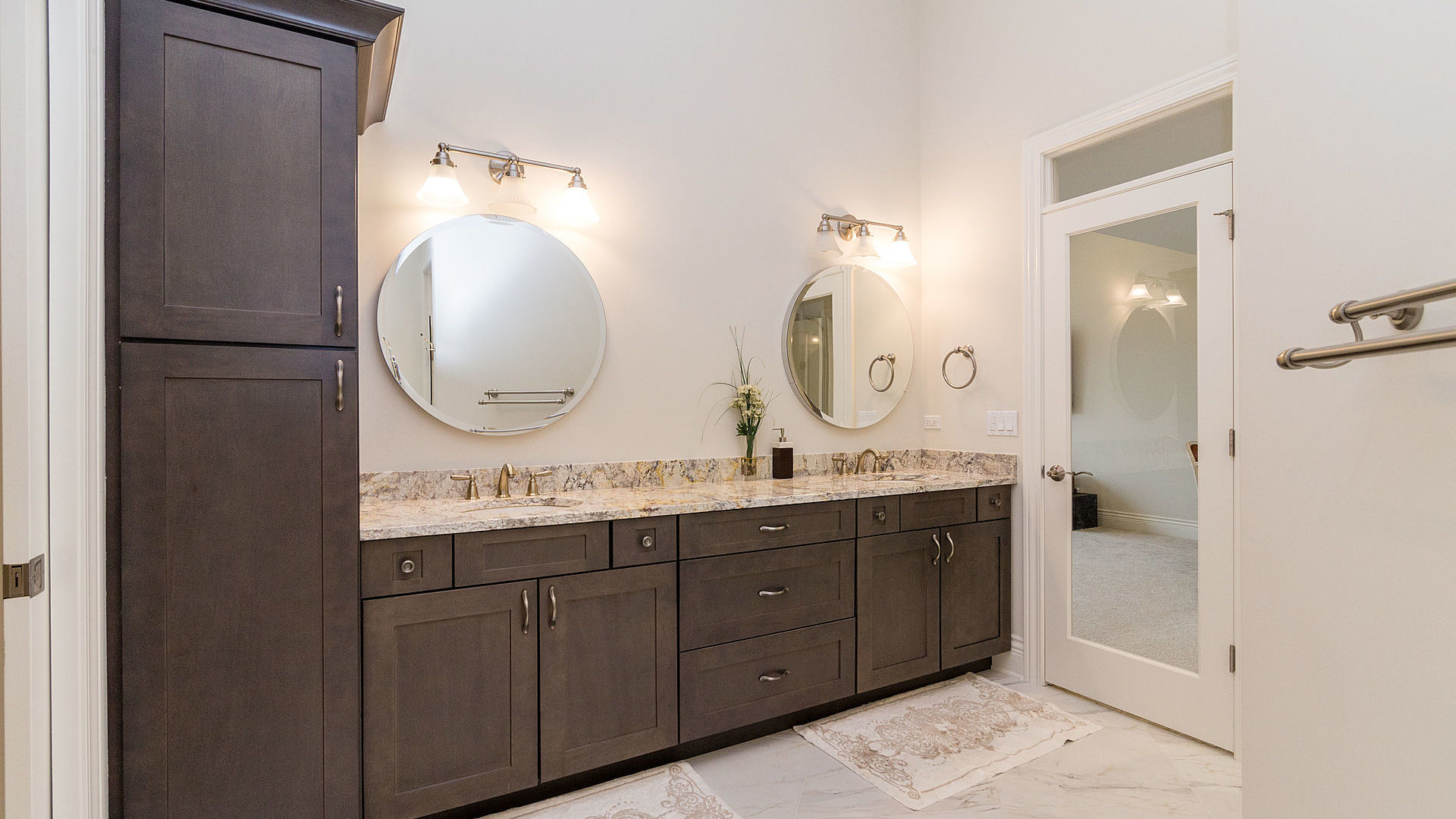 1412 Rue Paris Place Palatine, IL 60067 - Photo 12 of 20 a bathroom with a double vanity sink mirror and a shower