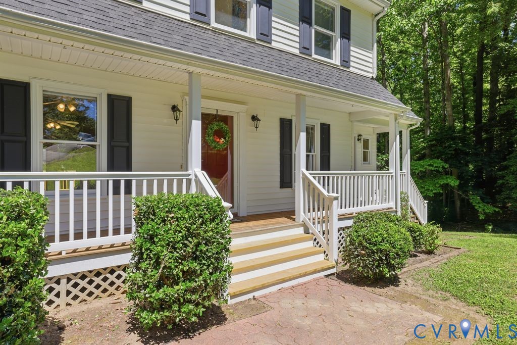 4301 Boones Bluff Way Chesterfield, VA 23832 - Photo 2 of 31 Full front porch with vinyl railing