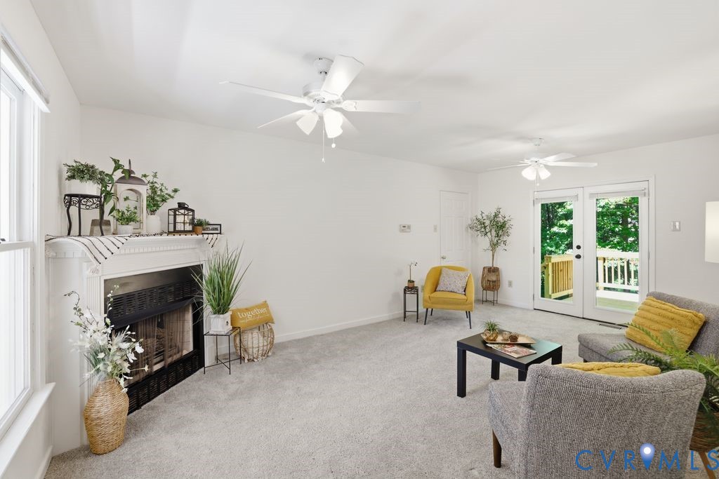 4301 Boones Bluff Way Chesterfield, VA 23832 - Photo 3 of 31 Gas fireplace , overhead lighting and fans.