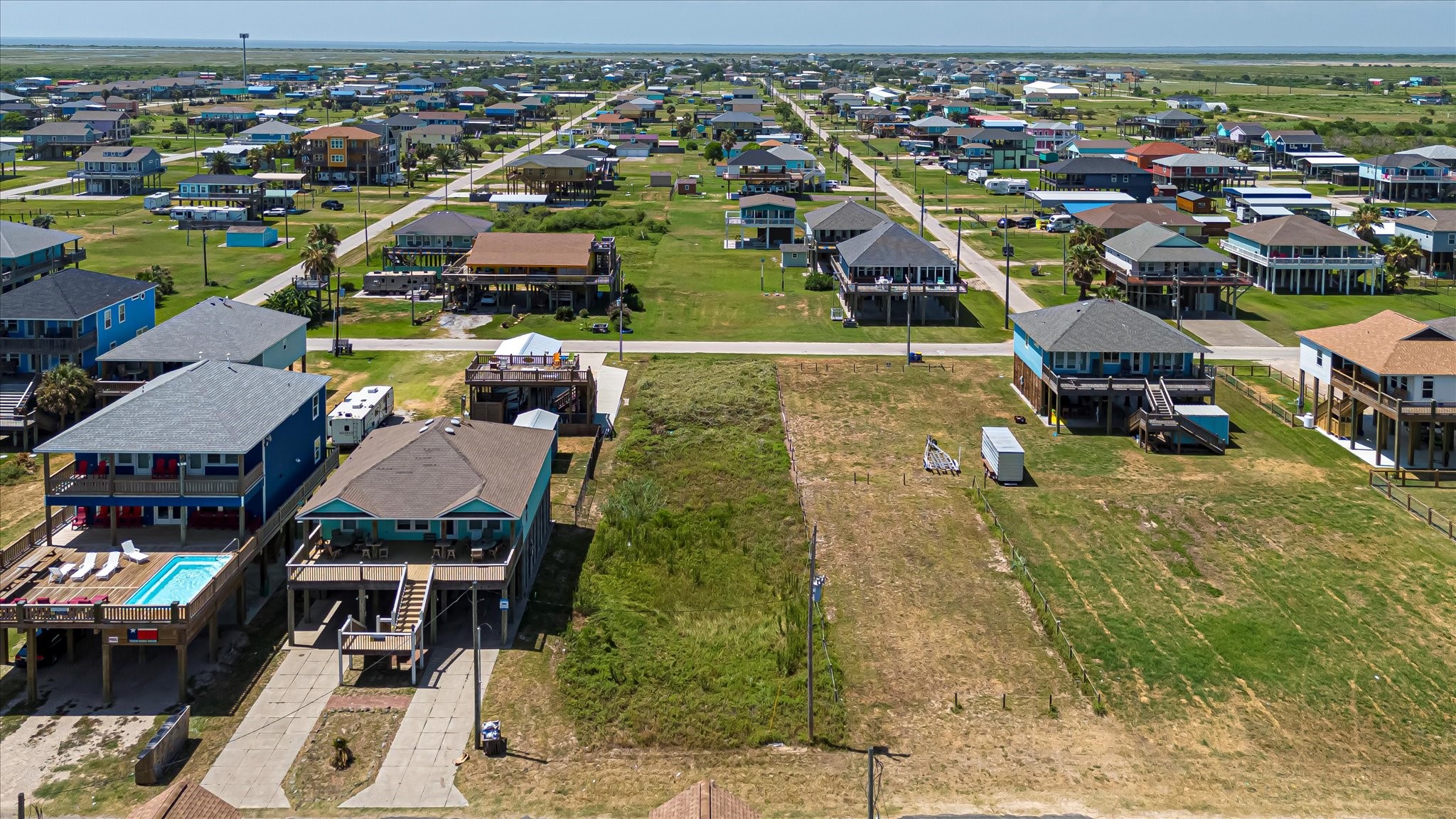 1126 Gulfview Road Crystal Beach, TX 77650 - Photo 25 of 28 an aerial view of residential houses with outdoor space