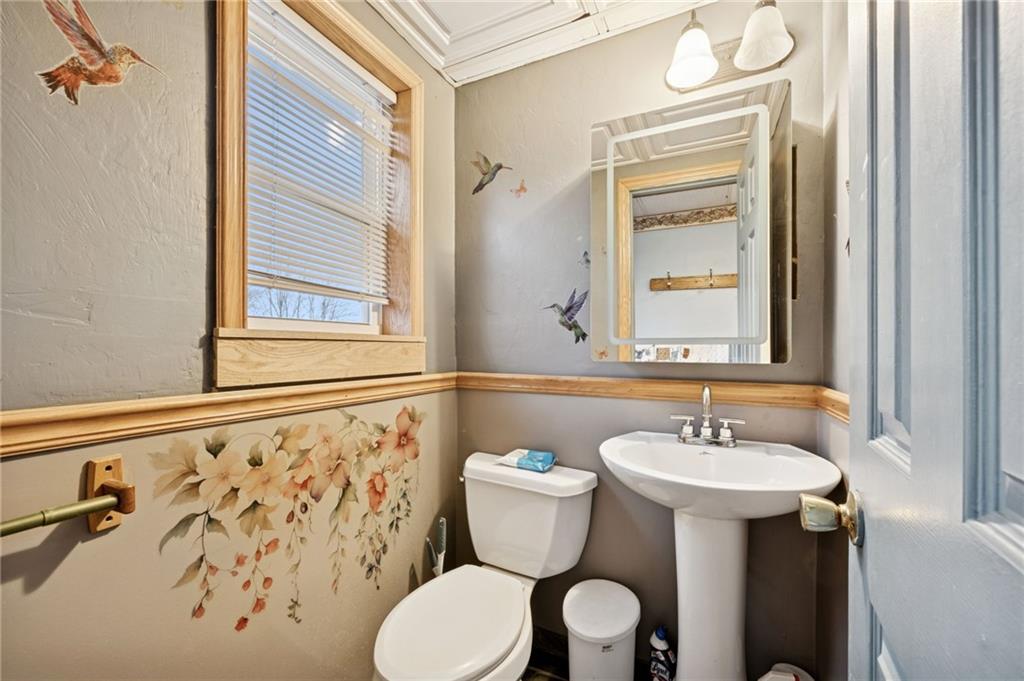 709 Westover Road Westover, PA 16692 - Photo 16 of 41 a bathroom with a sink and a mirror
