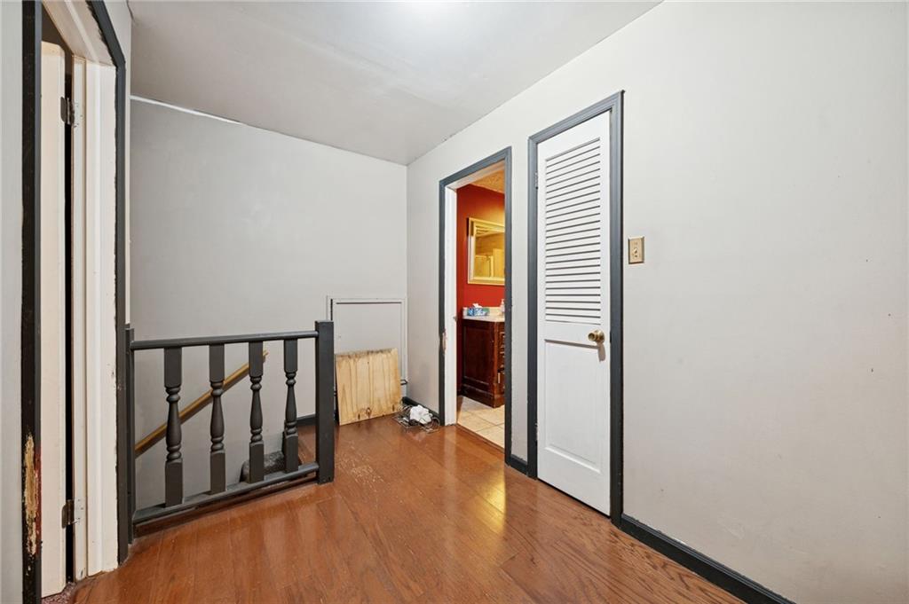 709 Westover Road Westover, PA 16692 - Photo 24 of 41 a view of a hallway with wooden floor and closet