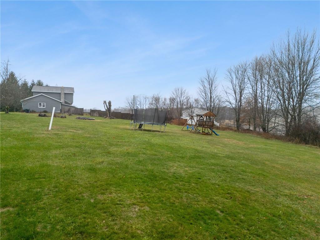 709 Westover Road Westover, PA 16692 - Photo 33 of 41 a backyard of a house with table and chairs