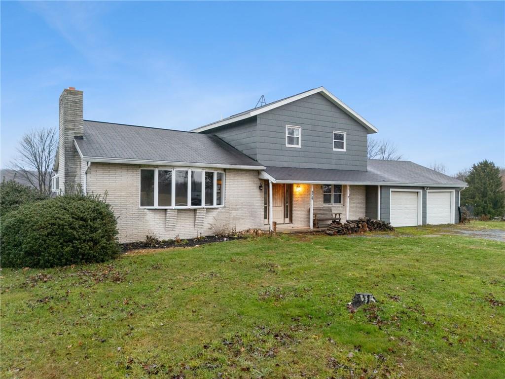 709 Westover Road Westover, PA 16692 - Photo 36 of 41 a front view of a house with a yard