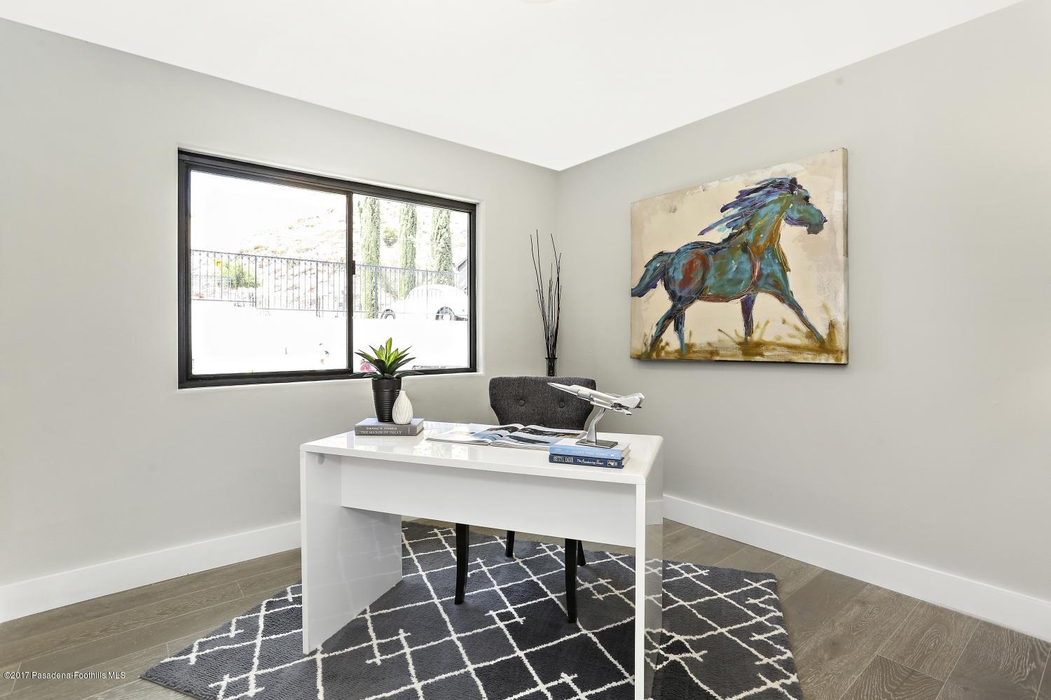 4614 Townsend Avenue Los Angeles, CA 90041 - Photo 16 of 38 a view of a workspace with furniture