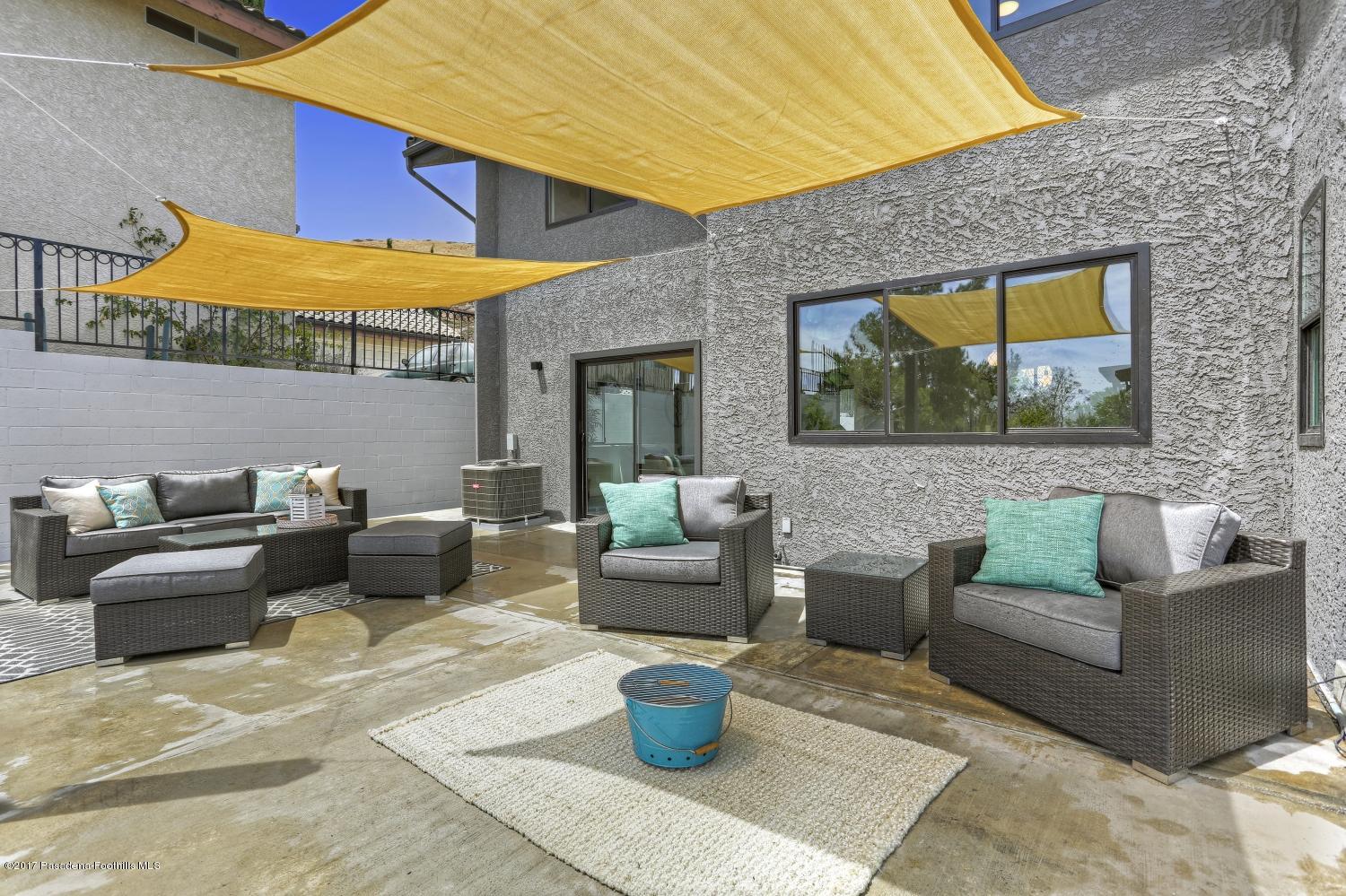 4614 Townsend Avenue Los Angeles, CA 90041 - Photo 31 of 38 a view of a patio with couches and a potted plant