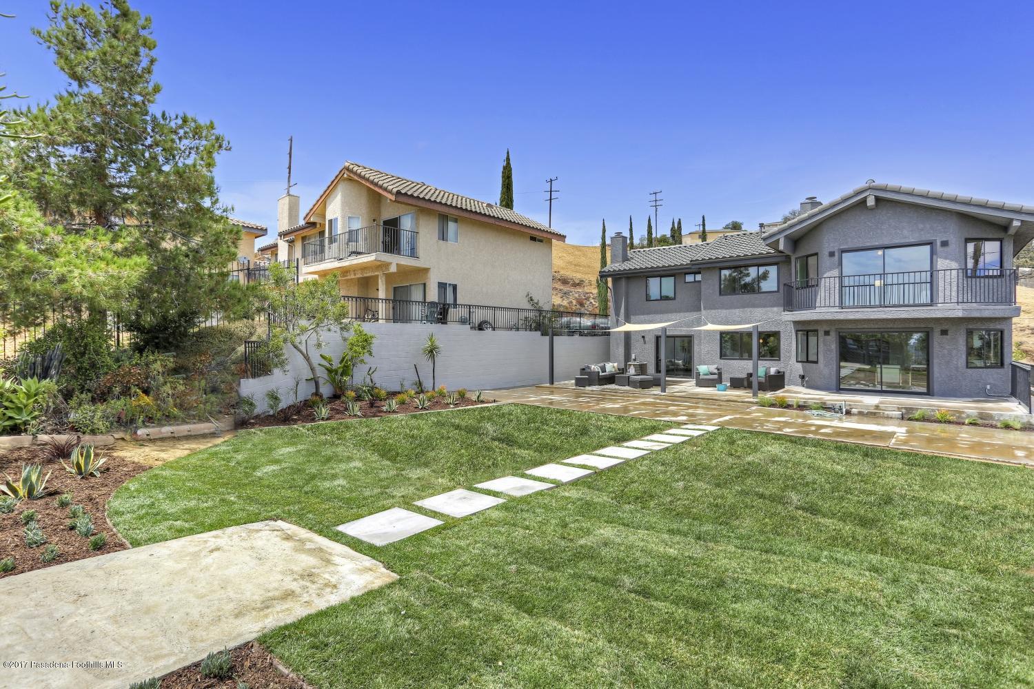 4614 Townsend Avenue Los Angeles, CA 90041 - Photo 35 of 38 a front view of a house with swimming pool having outdoor seating