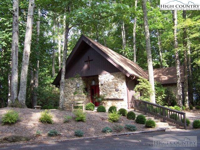 Elk Ridge Road Deep Gap, NC 28618 - Photo 36 of 47 a view of a house with a yard