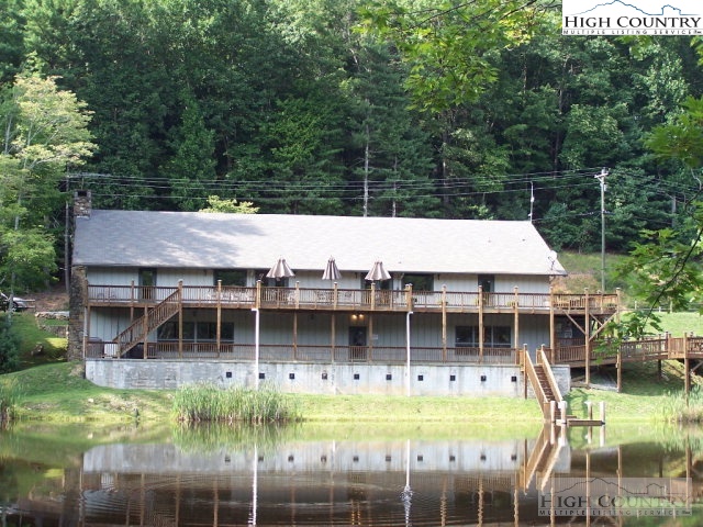 Elk Ridge Road Deep Gap, NC 28618 - Photo 39 of 47 a aerial view of a house with swimming pool and sitting area