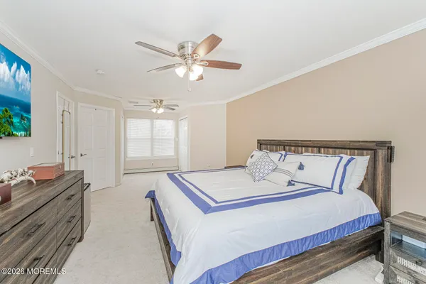 a bed room with a bed and a window