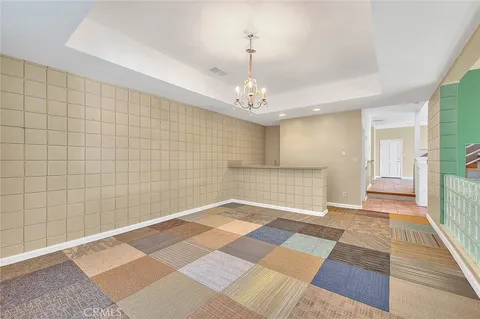 a bathroom with a granite countertop sink and vanity