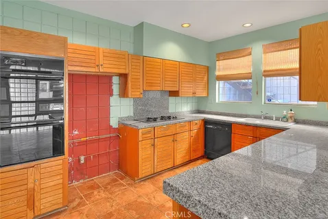 a bathroom with a bathtub a sink and a mirror