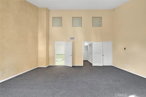 a view of a hallway with staircase