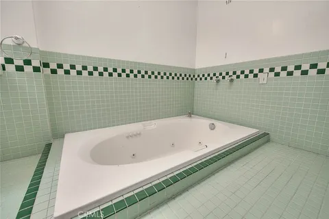 a view of empty room with windows