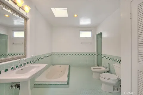 a view of a house with a potted plant