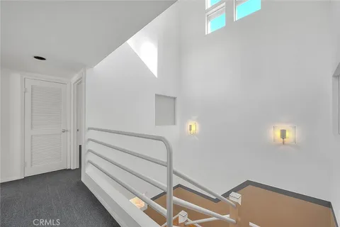 a view of a house with a large trees