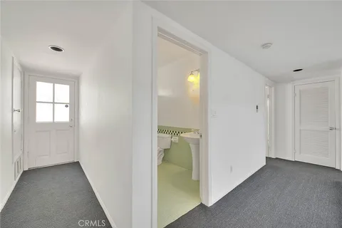 a view of a garden from a balcony