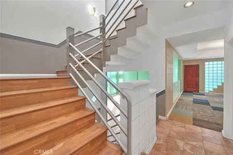 a view of a hallway with a chandelier