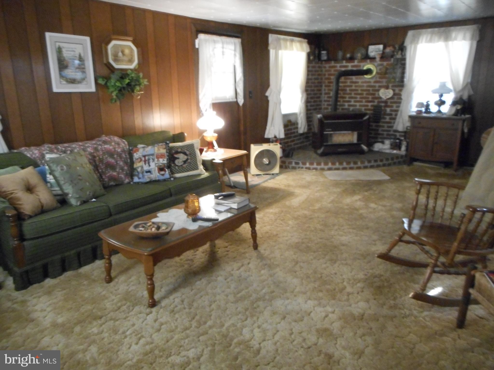 3089 Householder Road Hedgesville, WV 25427 - Photo 15 of 30 Living Room w/ gas stove. Keeps it warm