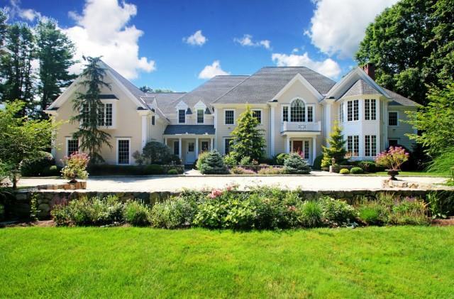278 Chestnut Hill Road Wilton, CT 06897 - Photo 1 of 1 a front view of a house with a yard