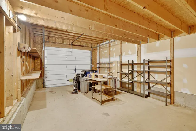 a view of a chairs and table in the balcony