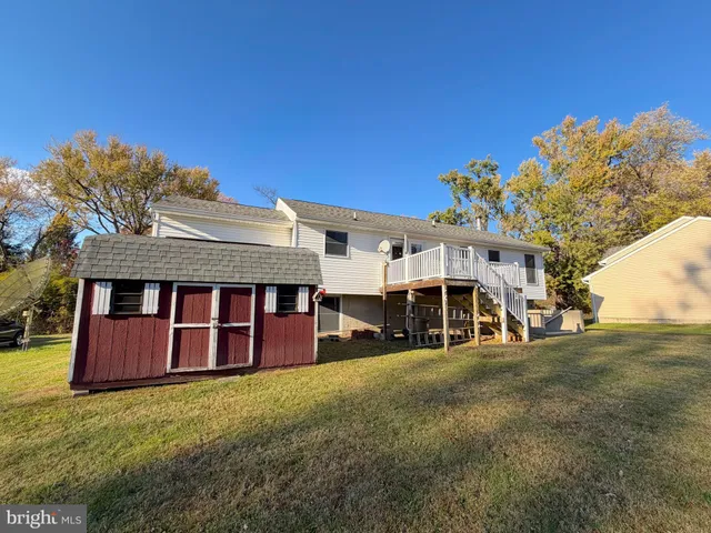 a view of a house with a big yard