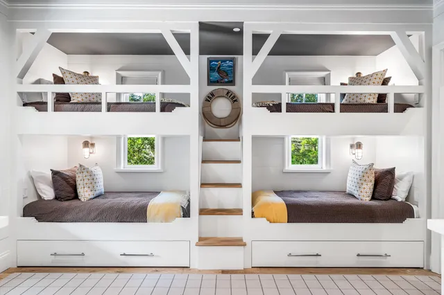 a bathroom with a sink and a window