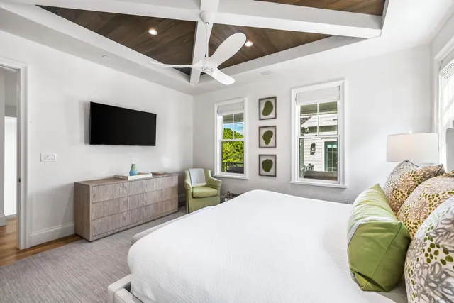 a view of a bathroom with sink and mirror