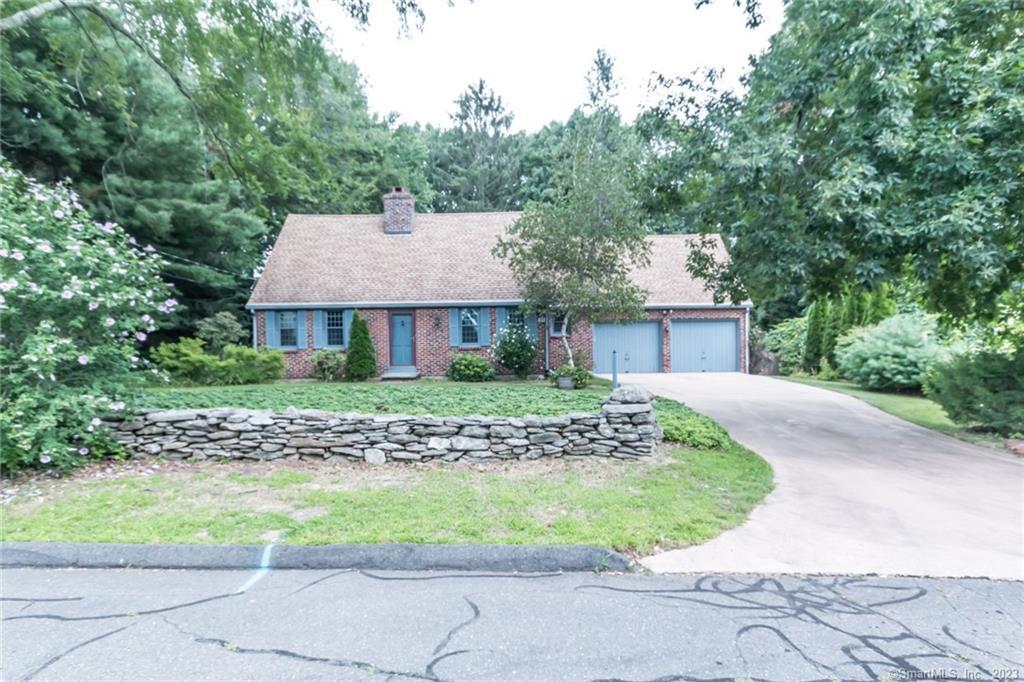 66 Norwood Road Bristol, CT 06010 - Photo 1 of 1 a front view of a house with a garden