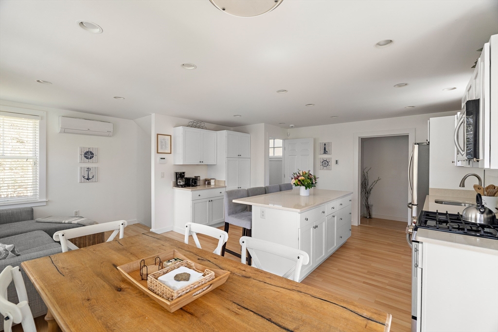 13 Young Street Edgartown, MA 02539 - Photo 6 of 29 a living room with furniture and a table