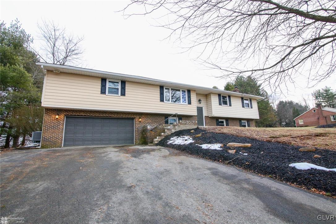 437 Hahn Road Nazareth, PA 18064 - Photo 2 of 38 a front view of a house with a yard