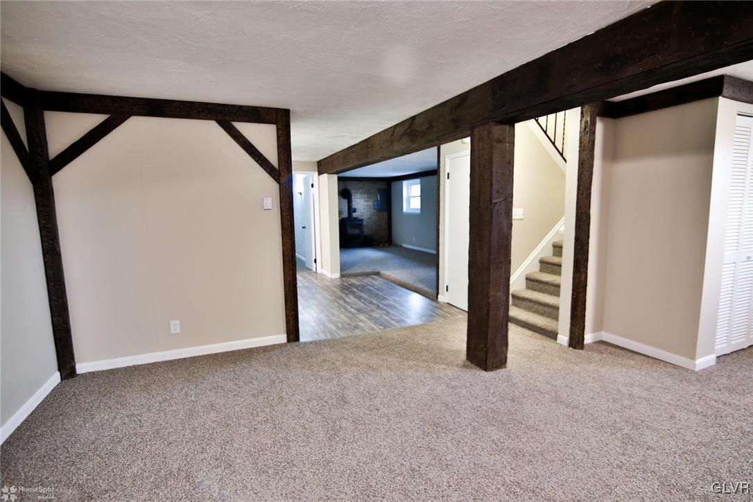 437 Hahn Road Nazareth, PA 18064 - Photo 26 of 38 a view of a livingroom with wooden floor and stairs