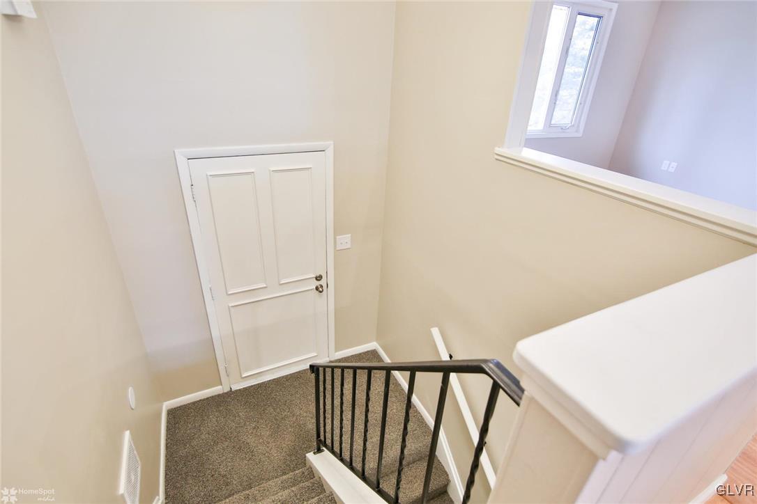 437 Hahn Road Nazareth, PA 18064 - Photo 4 of 38 a view of a hallway with windows