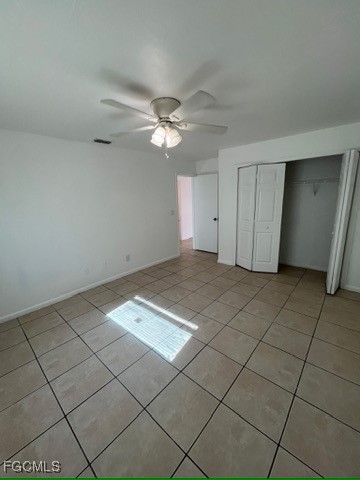 13861 First Street, Unit 13863 Fort Myers, FL 33905 - Photo 5 of 11 a view of an empty room and chandelier fan
