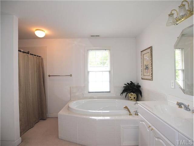 8209 Buffaloe Road Knightdale, NC 27545 - Photo 5 of 18 Get a fresh start to the day or a peaceful finish at night in the HUGE GARDEN TUB located in the LUXURIOUS Master Bath.