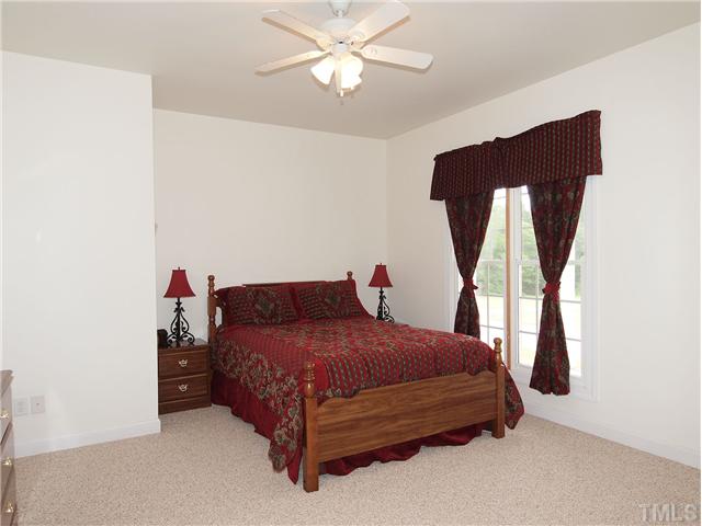 8209 Buffaloe Road Knightdale, NC 27545 - Photo 9 of 18 The Bonus Room on the main floor can be used for a GUEST SUITE! It has it's OWN FULL BATH!