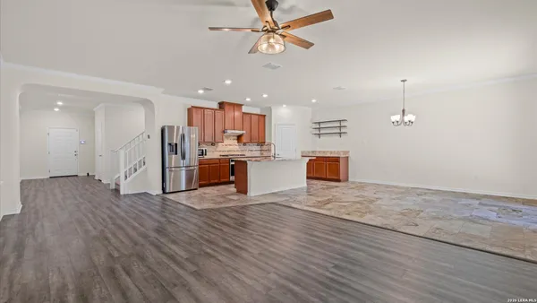 a view of kitchen with wooden floor and window