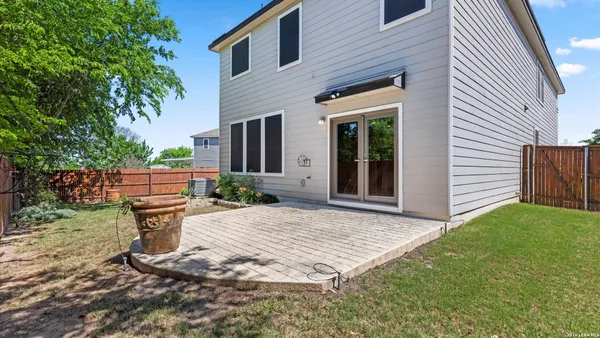 a house view with a garden space
