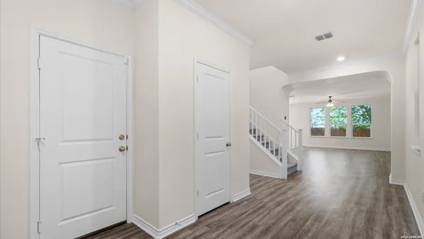 a view of entryway with wooden floor