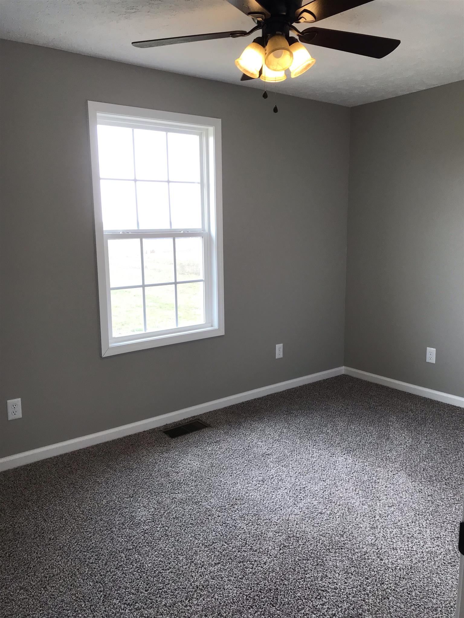 412 Fowler Ford Road Portland, TN 37148 - Photo 12 of 16 an empty room with a window