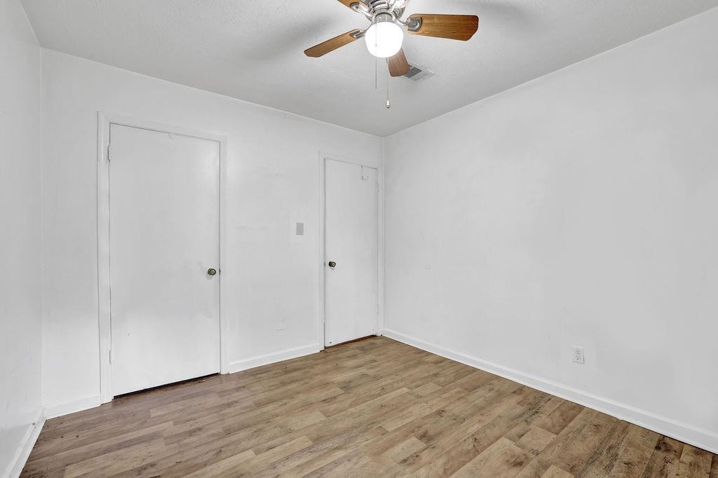5012 Galbraith Circle Stone Mountain, GA 30088 - Photo 19 of 29 wooden floor in an empty room