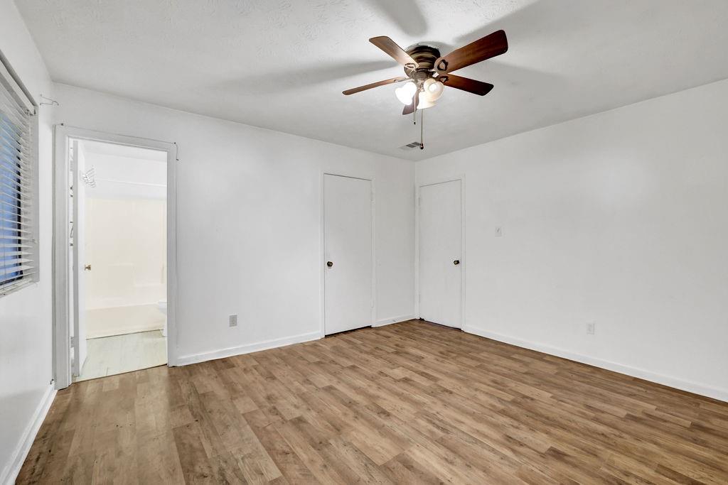 5012 Galbraith Circle Stone Mountain, GA 30088 - Photo 24 of 29 wooden floor in an empty room