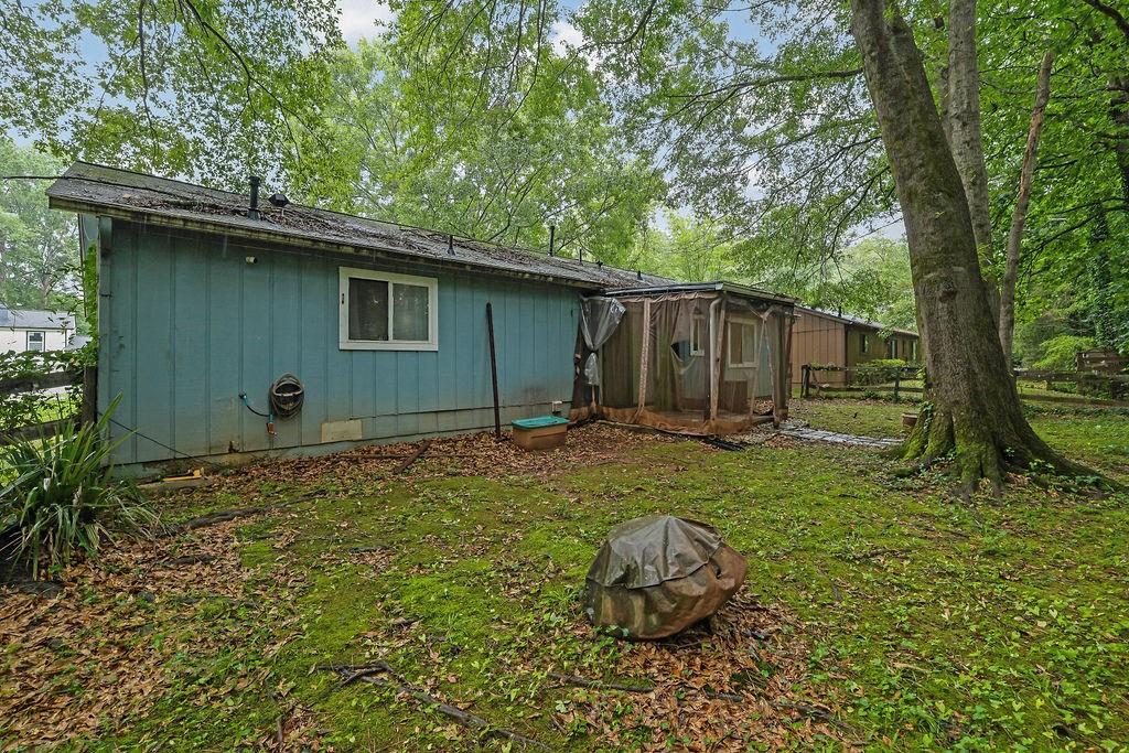 5012 Galbraith Circle Stone Mountain, GA 30088 - Photo 29 of 29 a backyard of a house with barbeque oven